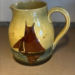 Yellow Ceramic Pitcher with Brown Sailboat Motif Hand painted early minor damage
